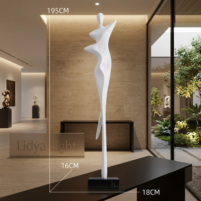 Sculpture Essence, silhouette élancée tenant deux sphères lumineuses